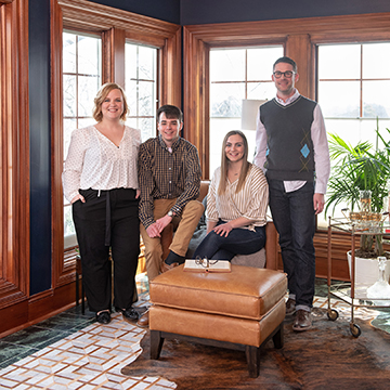 Students posing in a room they designed for the showhouse