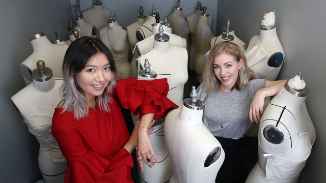 JCCC faculty Jill Patton and student Munisa Khuramova pose amid a group of dressmaker dummies.