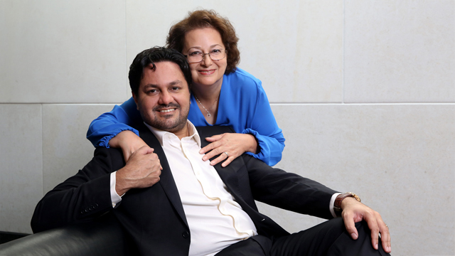 Doctor Behdad Miremadi and his mother, Rabeh Ghadiri, both graduates of Johnson County Community College.
