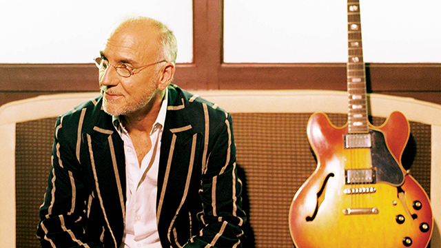 Promotional photo of Larry Carlton.