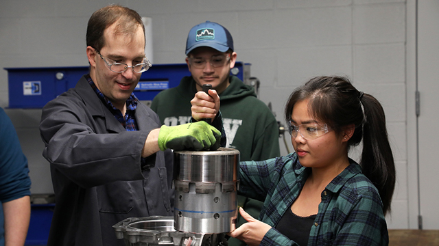 Student and instructor in auto education class