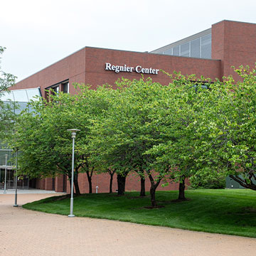 Exterior of the Regnier Center, with a courtyard in the foreground