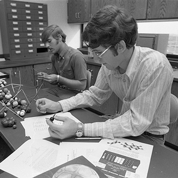 Students take a test in a science classroom.