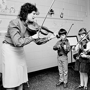 Children are taught to play the violin at JCCC.