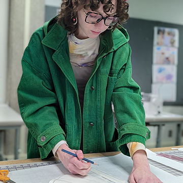 JCCC fashion student sketches out design