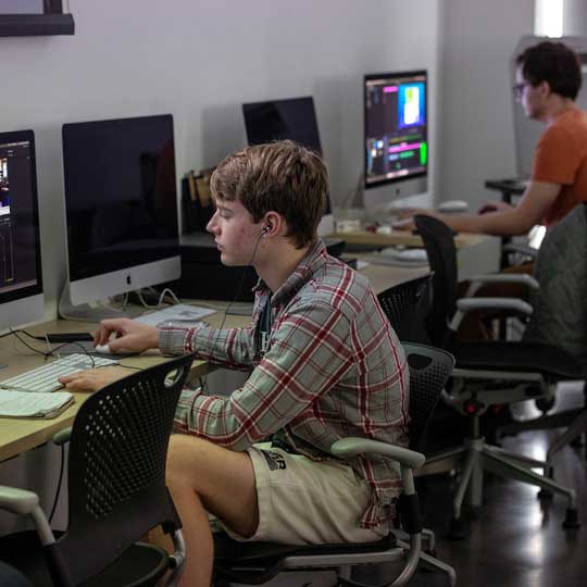 Students working in Film & Media Studies studio in the FADS building