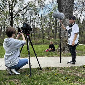Students on set, shooting a film