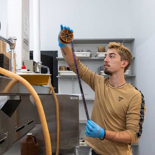 Inspecting negatives in the analog photography studio
