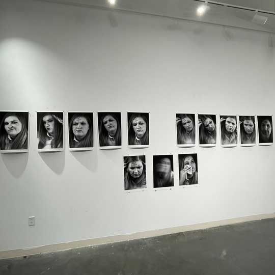 Installation of student self-portraits