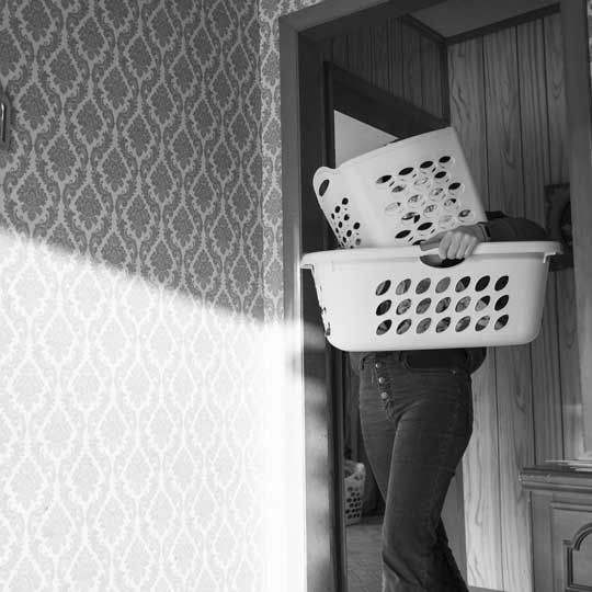 Silver gelatin mural print of woman doing laundry created for View Camera class