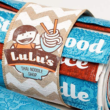 Student project work, Lulu's Thai Noodle Shop napkin wrap