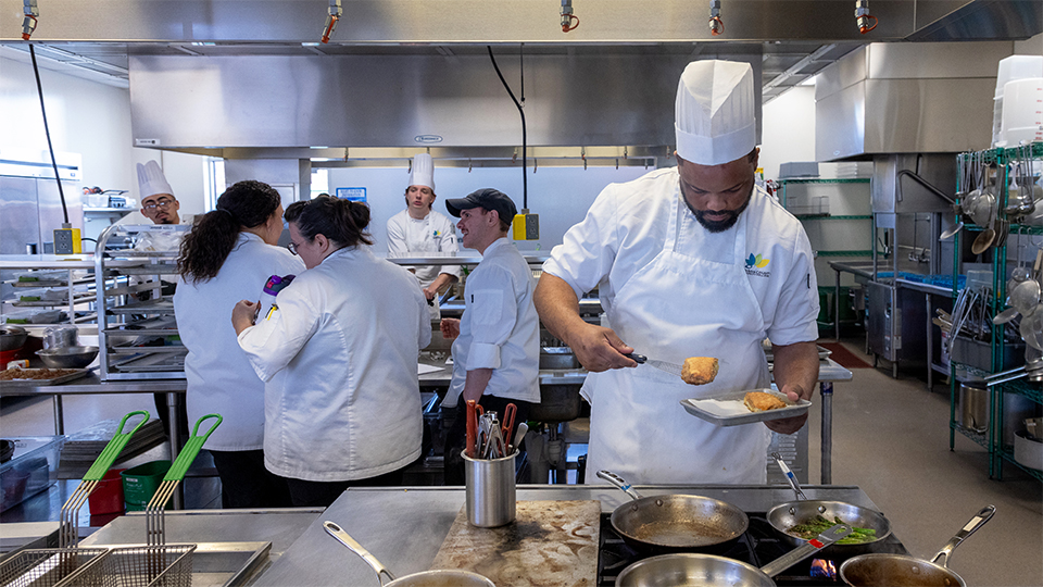 Culinary students working in WHCA state-of-the-art kitchen