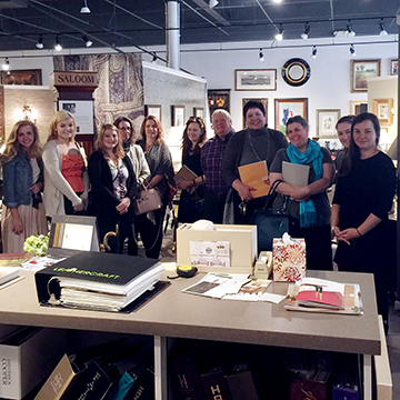 Student group photo at an interior design business