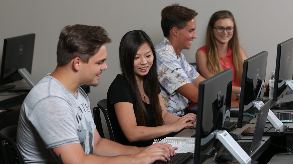 College Now students taking a computer class