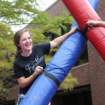 A student enjoys playing a game during the Fall Cav Kickoff event.