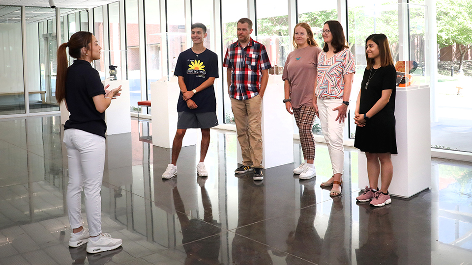 A group of prospective students tour JCCC with a guide.
