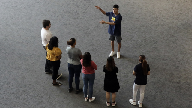 A JCCC guide gives a tour to a group of prospective students