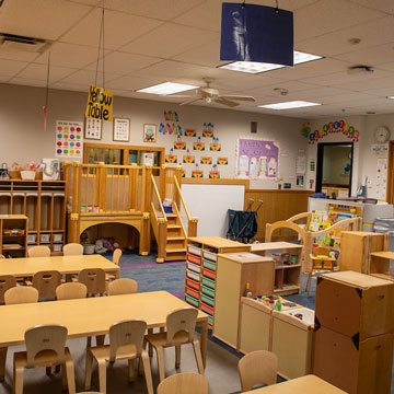Young Preschool Classroom, highlighting the loft, quiet area, and manipulatives. 