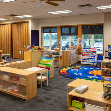 Pre-Kindergarten Classroom, showing different learning areas including puzzle, circle time, and dramatic play.