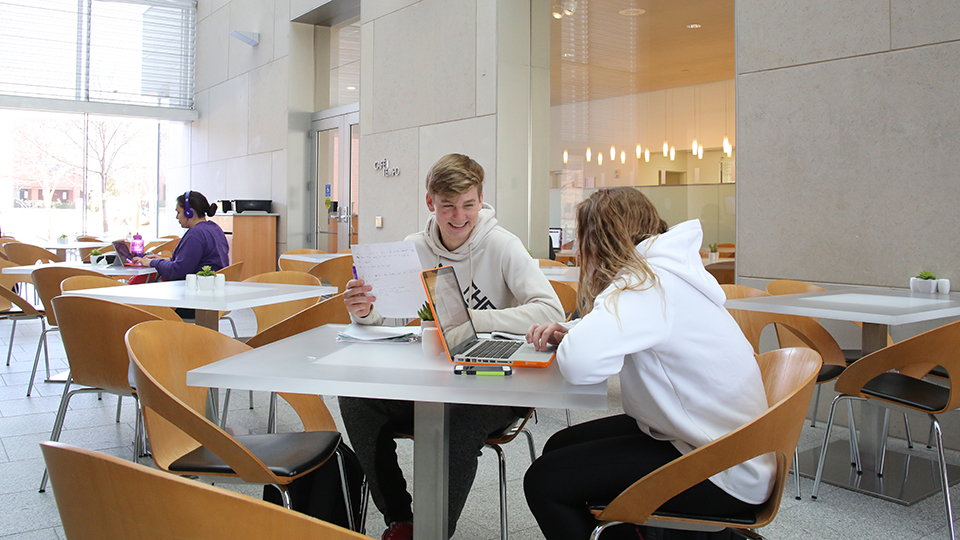 Students dining and studying at Cafe Tempo