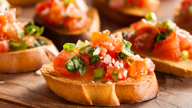 A display of crostini - salsa on a toasted baguette slice