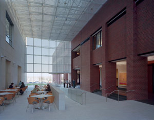 The Atrium space features a large glass entry wall on each end.