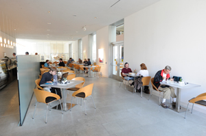 Interior of Cafe Tempo features tables suitable for individuals, couples and groups.