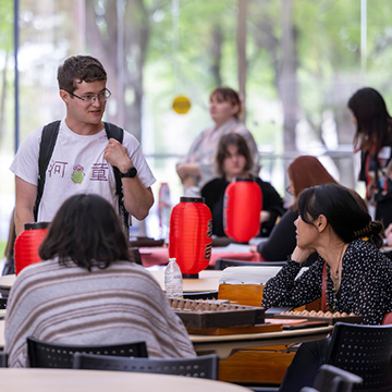 student mingle in the Nerman atrium during the Japanese Shorts Festival at JCCC