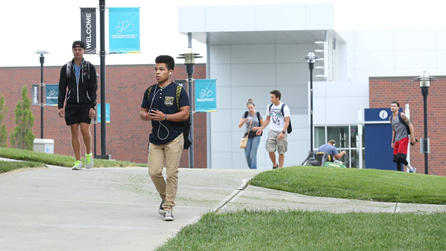 Students walk on the JCCC campus.
