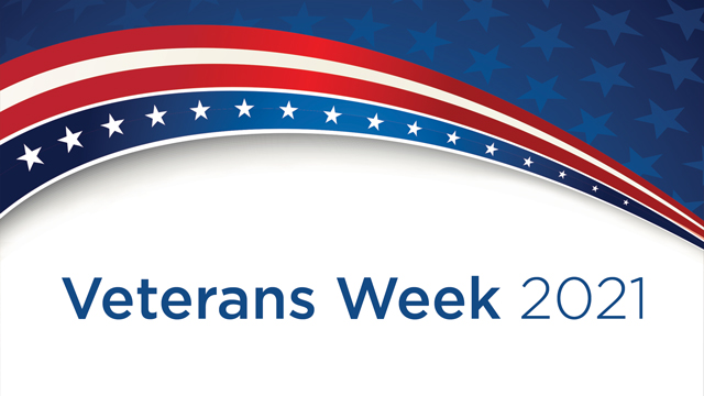 A red, white and blue swoosh over the words JCCC Veterans Week 2021.