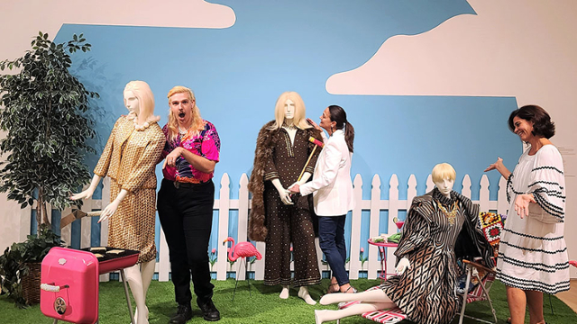 Artist Boi Boy and Professors Joy Rhodes and Britt Benjamin interact with mannequins in their exhibition "Adorned."