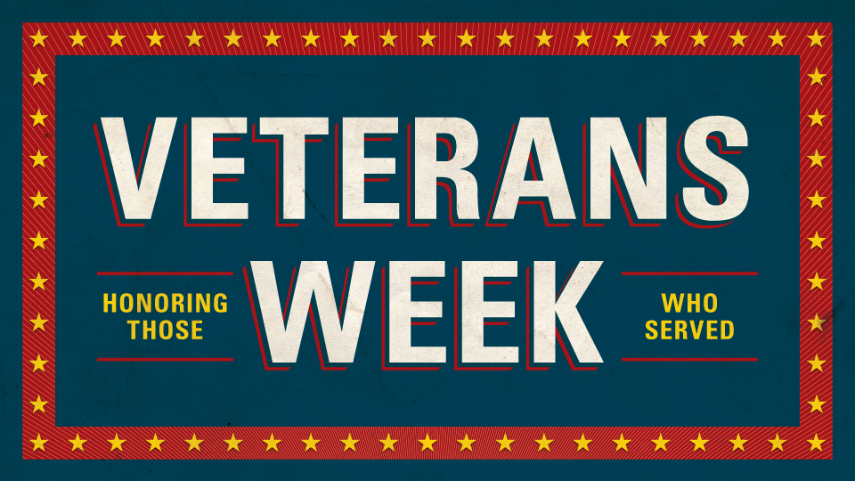 Poster that says Veterans Week Honoring Those Who Served.
