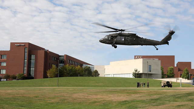 A Black Hawk helicopter landing on the JCCC campus.