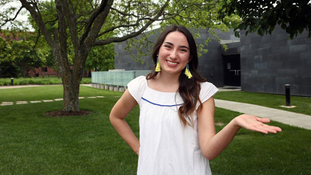 Cata Wedman posing outside on campus