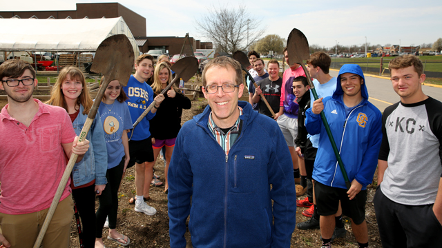 College Now professor Jeff Witters with students studying environmental science