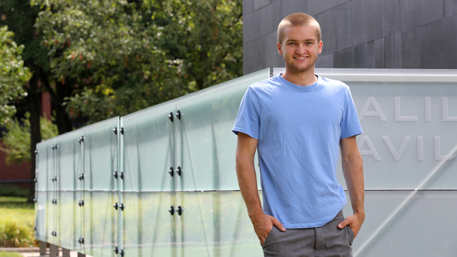 Eric Fecteau posing outside Galileo's Pavilion