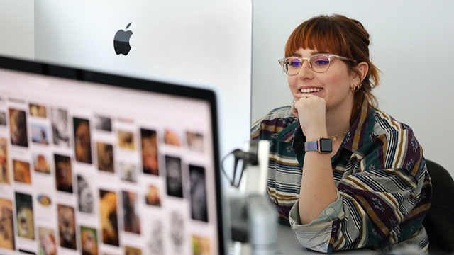 Graphic design student using a computer