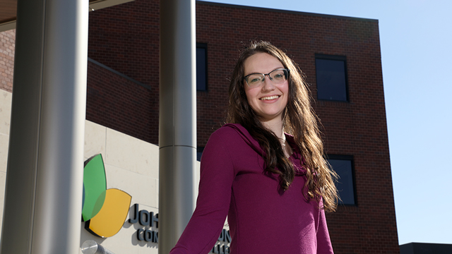 JCCC student Jacquelyn White standing outside the Student Center on the JCCC campus.