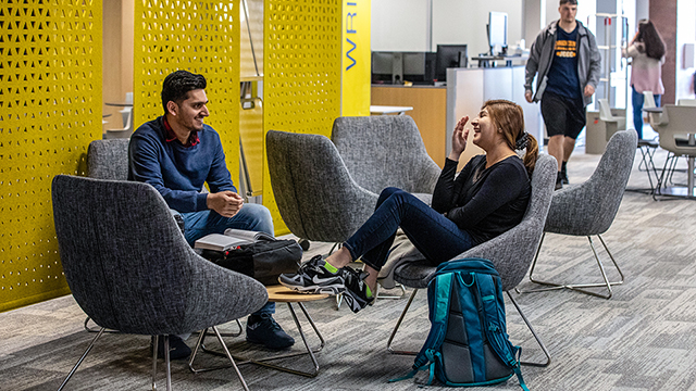 Students laughing and talking in the Academic Resource Center