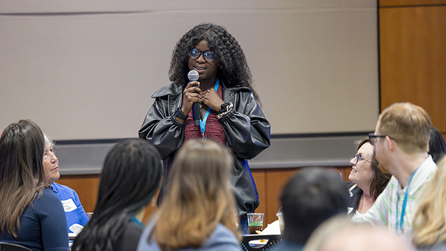 Jada Gordon speaks in front of an audience