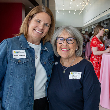 two smiling women