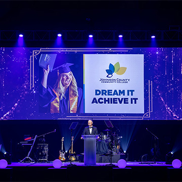 a man speaking at the 2025 Some Enchanted Evening Gala