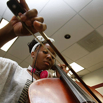 A violinist concentrating during performance