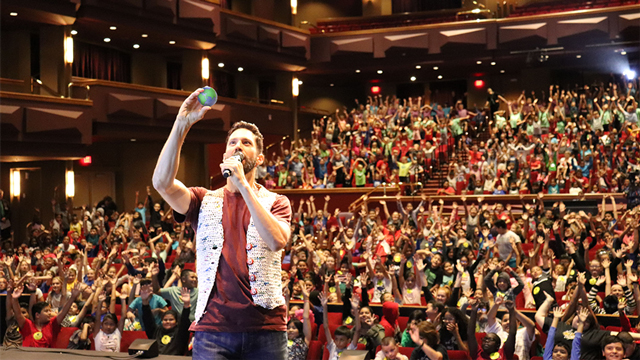 Joey FineRhyme in front of a crowd