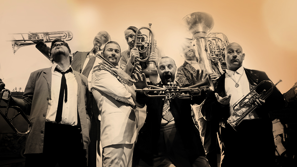 Seven members of Mnozil Brass and their instruments