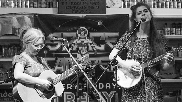 Beth Watts Nelson and Kelly Hunt performing on stage