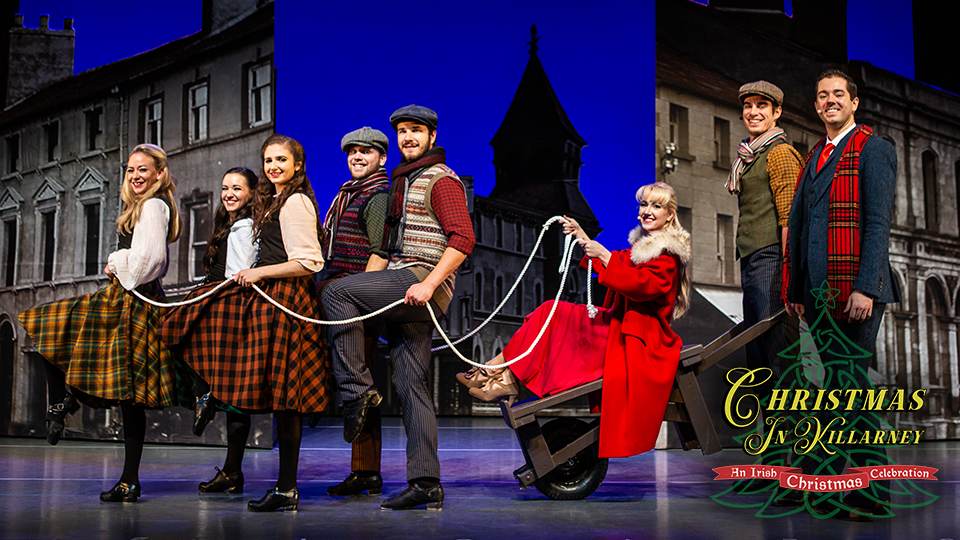 actors on stage with the words Christmas in Killarney