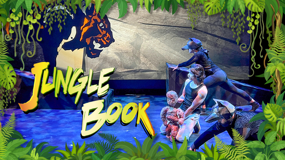 an actor on stage next to an image of a tiger and the words Jungle Book