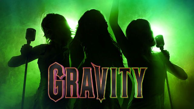 silhouette of three singers with a glowing green background and the word Gravity