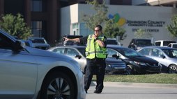 JCCC police officer assisting with a vehicle issue